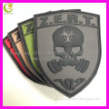 Low price factory custom logo garment pvc lable/pvc chapter/rubber patches/silicone garment label